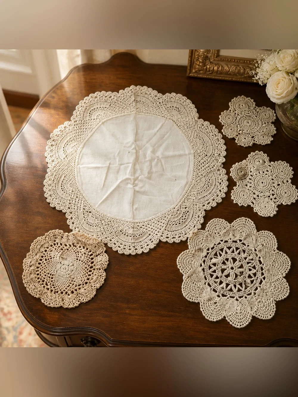 Lot of five vintage doilies
